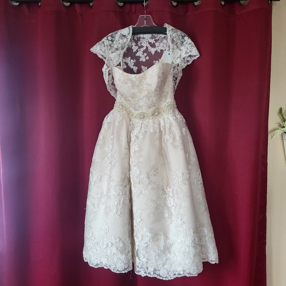 Flower dress for a girl.Never worn. Brought at a bridal store.